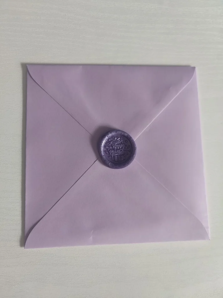 Card With A Purple Wax Seal